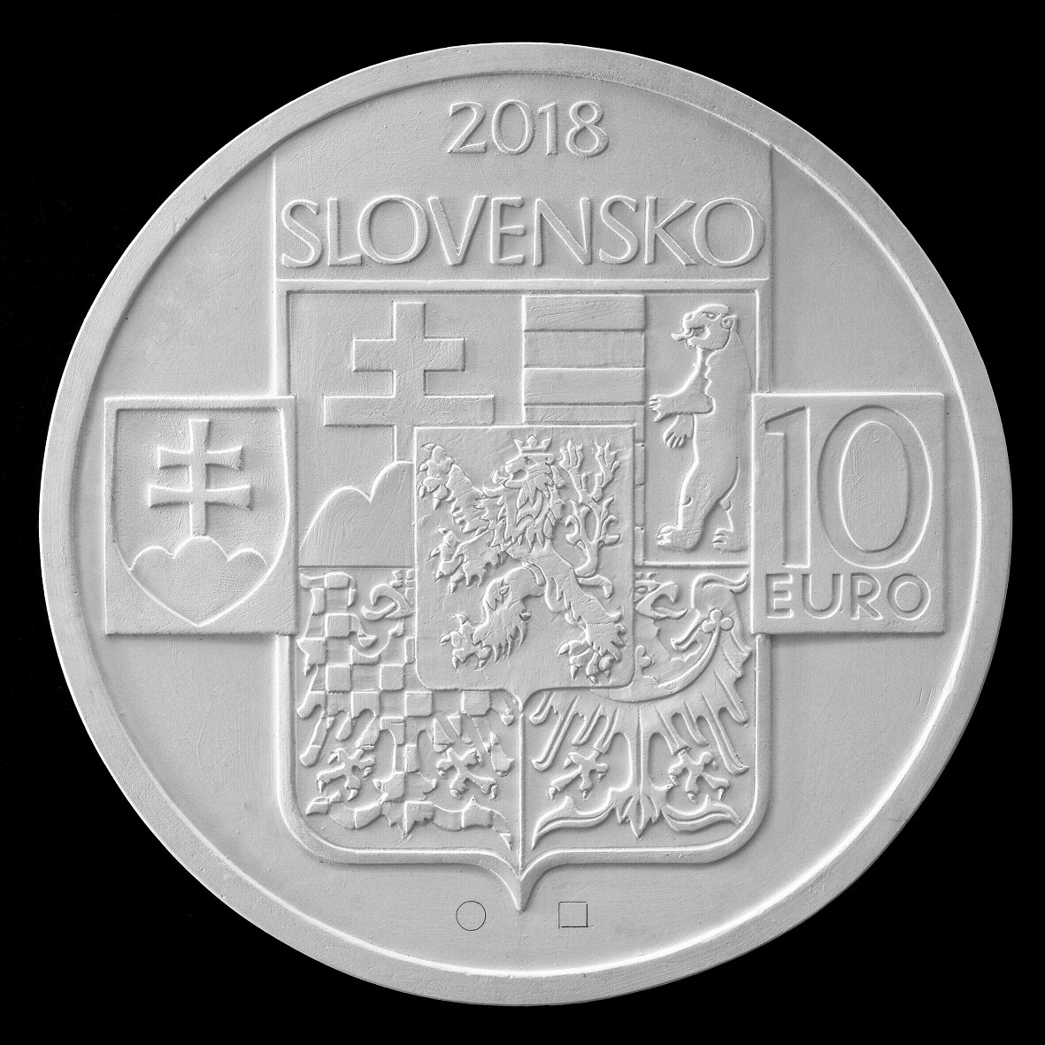 Second prize and the design selected for the coin