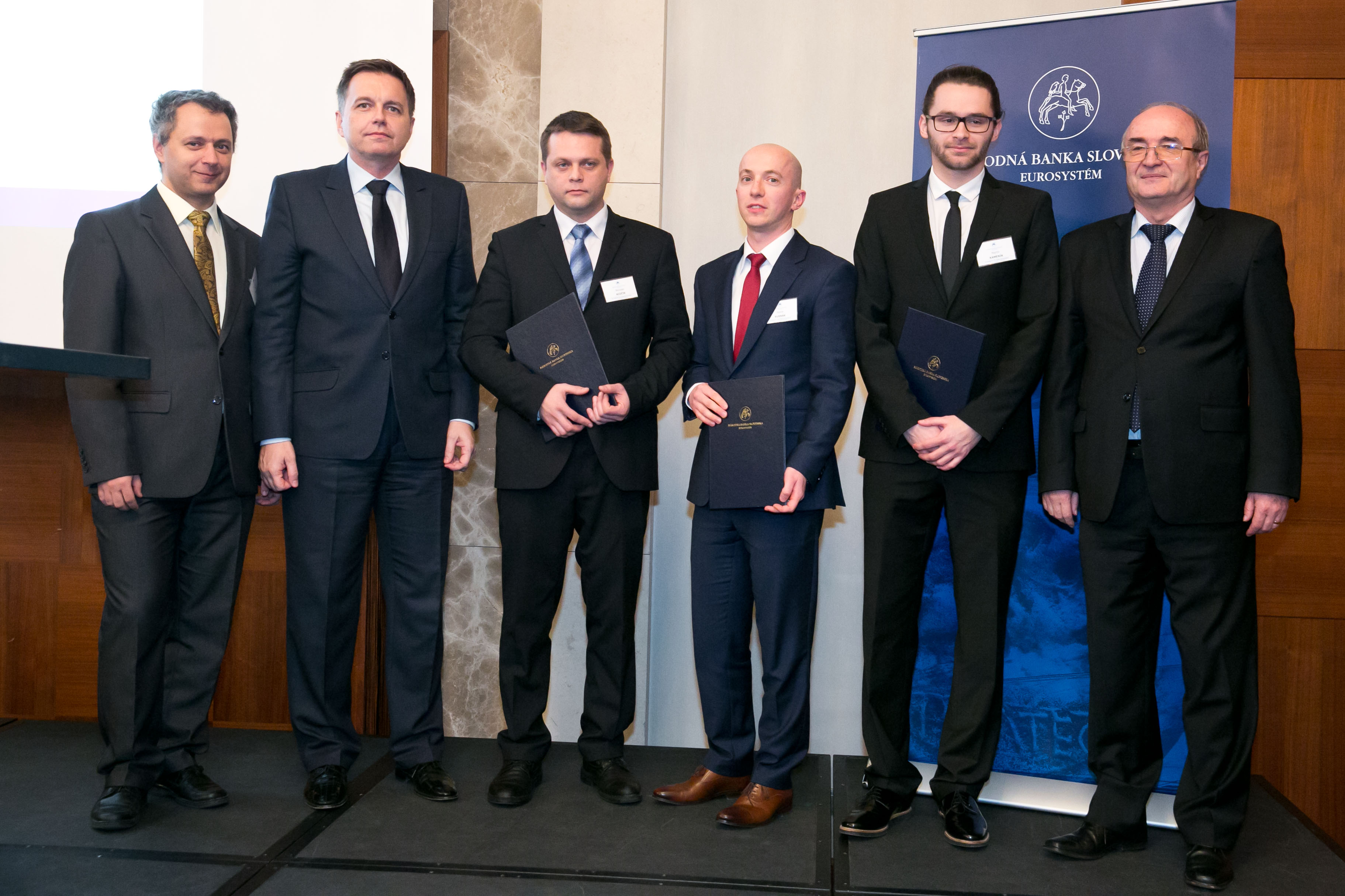 From right: Jozef Makúch (NBS Governor), Martin Kameník (2nd place), Marek Rusnák (1st place), Miroslav Kľúčik (3rd place), Peter Kažimír (Minister of Finance of the SR), Martin Šuster (NBS)