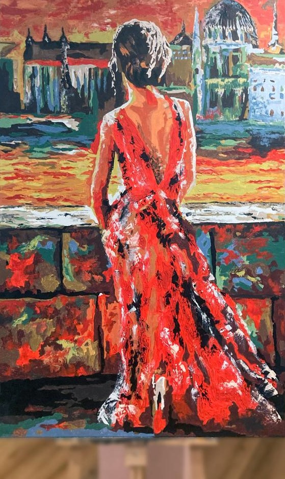 Vystavený obraz Dany Schmidtovej: žena v červených šatách na nábreží